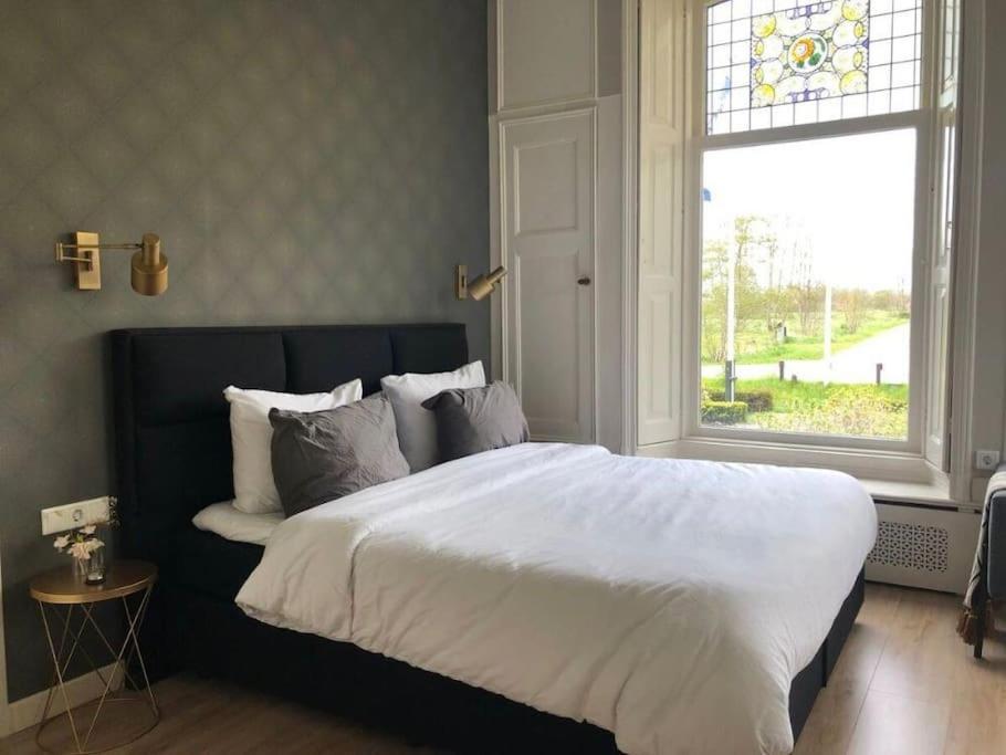 Villa Statige Boerderijwoning Met Vrij Uitzicht En Tuin à Hoogzand Extérieur photo